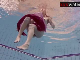 Smoking super Russian redhead in the pool